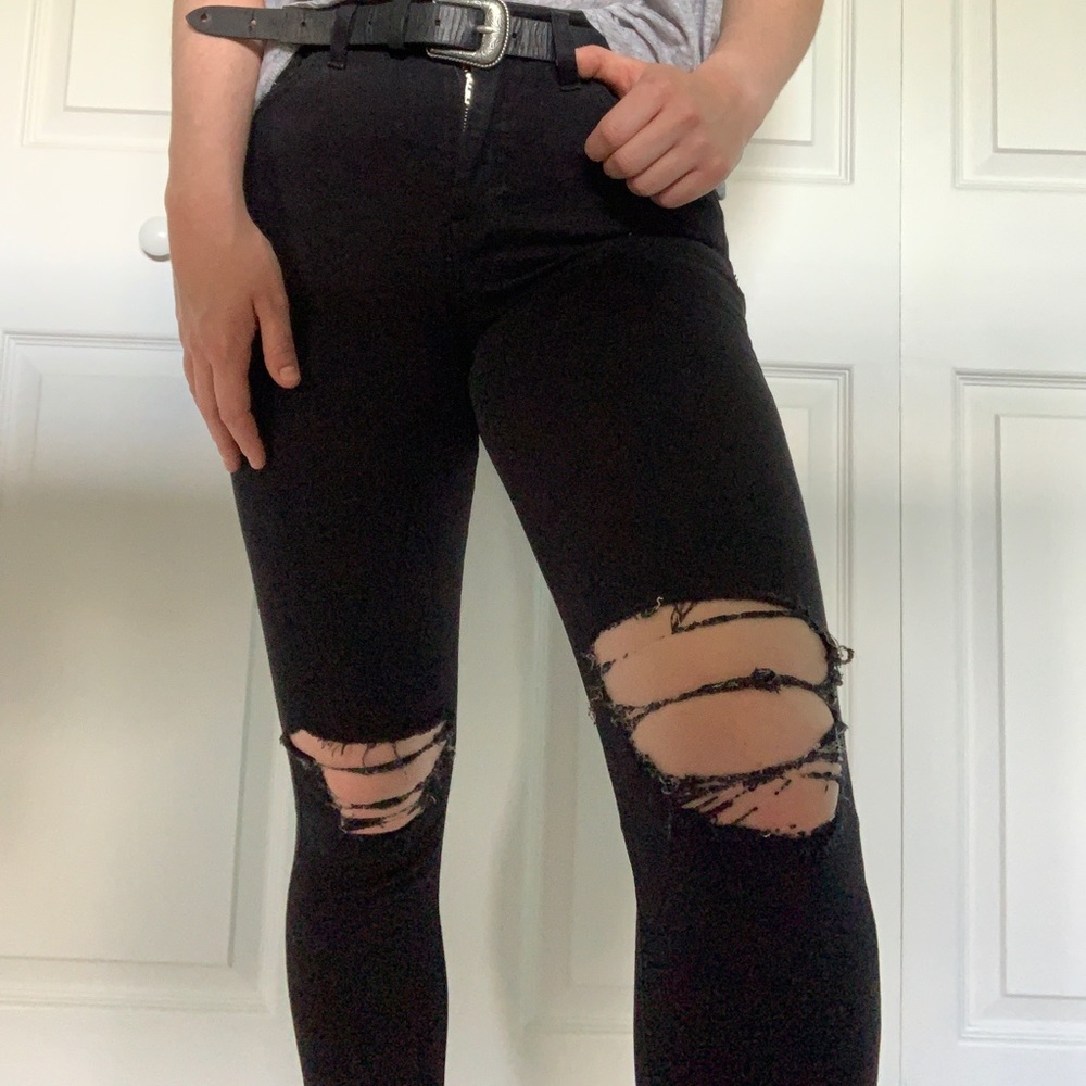 Black ripped skinny jeans from Topshop